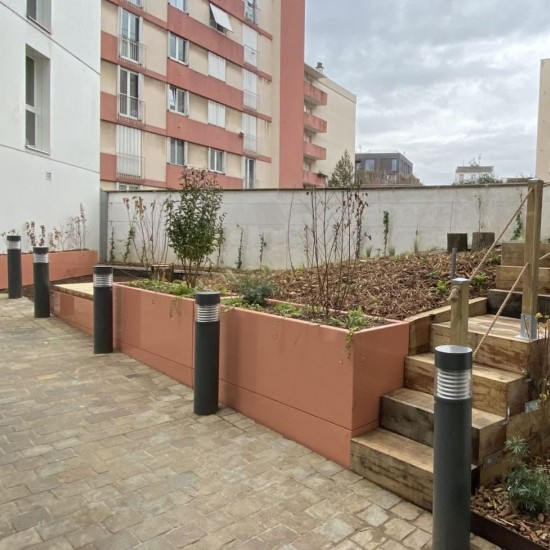 Aménagement d'une cour d'immeuble avec récupération des eaux de pluie